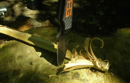 Using the knife to make feather sticks