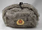 Grey acrylic fur with badge