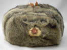 Brown acrylic fur with badge